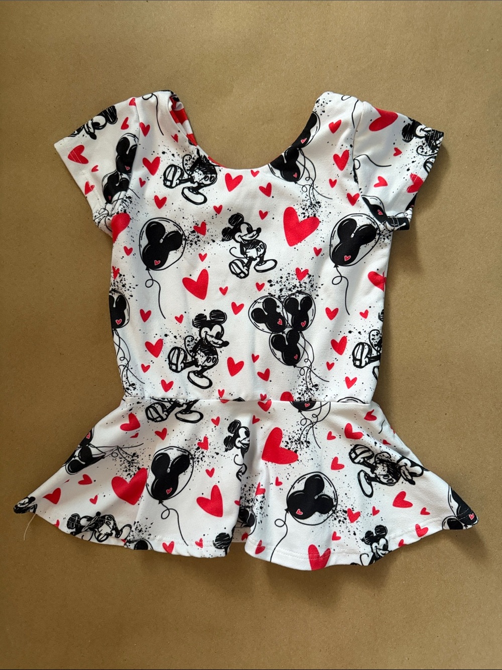 Girls White Peplum Top with Mickey Mouse & Mickey Balloon Print